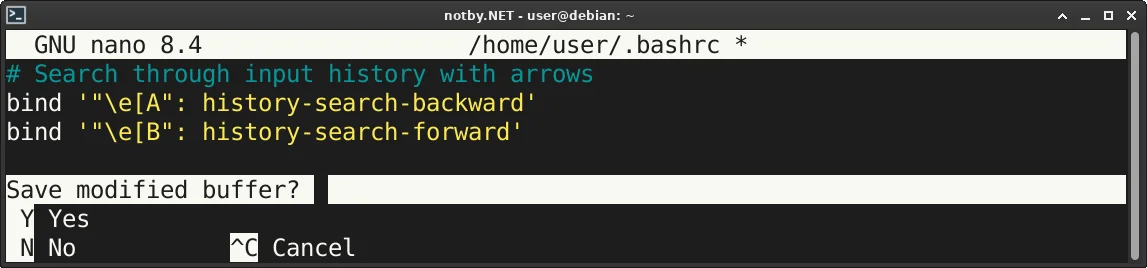 В текстовой редакторе nano открыт файл ~/.bashrc, внутри файла добавлены три строки: # Search through input history with arrows, bind '"\e[A": history-search-backward', bind '"\e[B": history-search-forward' и задан вопрос "Save modified buffer?" для сохранения изменений